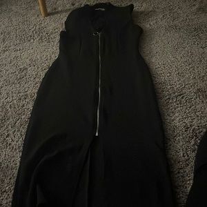 I’m selling this black dress. The zipper is the front of the dress